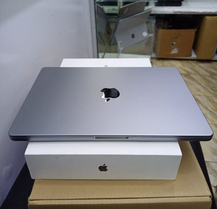 . **For a Product Promotion (like the MacBook Pro)**: 
   - "Unleash your creativity with the power of the MacBook Pro. Elevate your productivity! 💻✨"
   
. **For a Personal Photo with a MacBook**:
   - "Working hard or hardly working? 👀💻 #MacBookPro #Productivity"

. **For a Tech Feature Highlight**:
   - "Performance meets elegance. Discover the extraordinary features of the MacBook Pro. #Apple"

. **For a Quote about Innovation**:
   - "Innovation distinguishes between a leader and a follower. - Steve Jobs #MacBookPro"